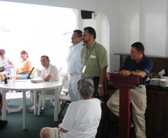 Captain, Panama Canal Pilot and Eric Castro, Exploration Leader