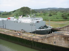 Automobile carrier entering locks